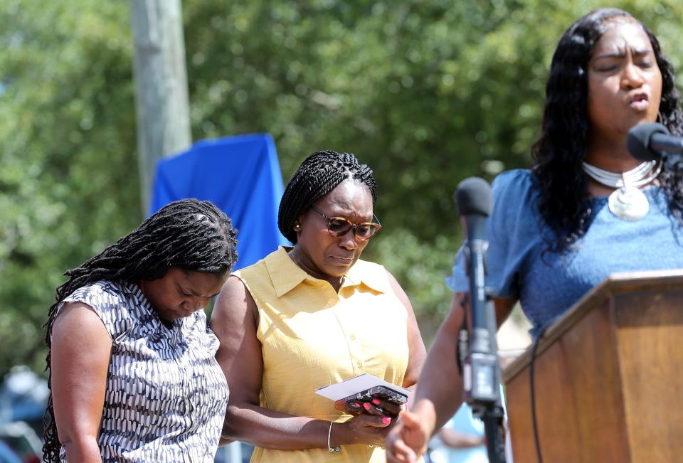 Wanda Cooper-Jones shows her emotions during a ceremony dedicating Albany Street in honor of her son Ahmaud Arbery on Tuesday August 9, 2022 in Brunswick Georgia.