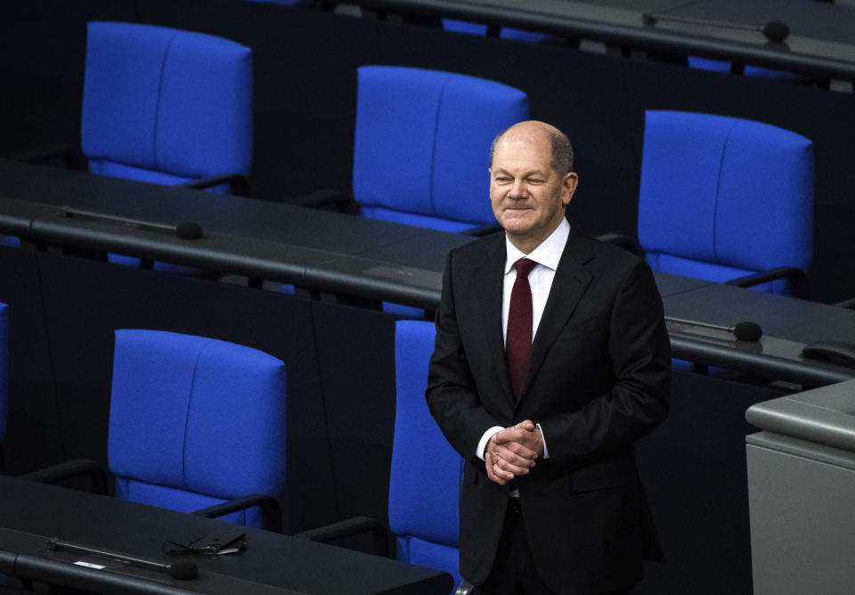 New elected German Chancellor Olaf Scholz waits before he is sworn in in the German Parliament Bundestag in Berlin, Wednesday, Dec. 8, 2021. The election and swearing-in of the new Chancellor and the swearing-in of the federal ministers of the new federal government will take place in the Bundestag on Wednesday. (Photo/Stefanie Loos)