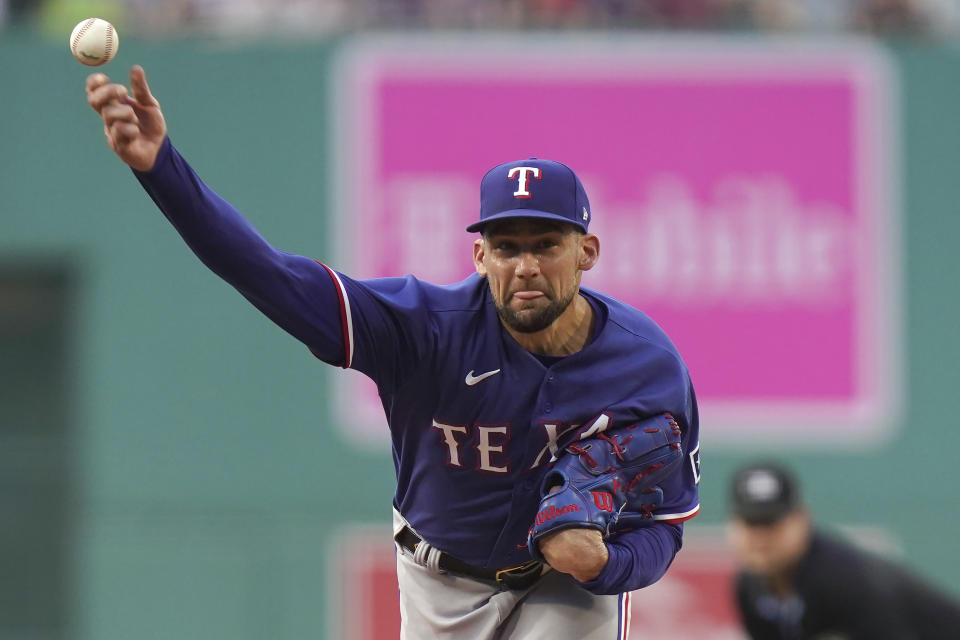 Texas Rangers' Nathan Eovaldi delivers a pitch to a Boston Red Sox batter during the first inning of a baseball game Thursday, July 6, 2023, in Boston. (AP Photo/Steven Senne)