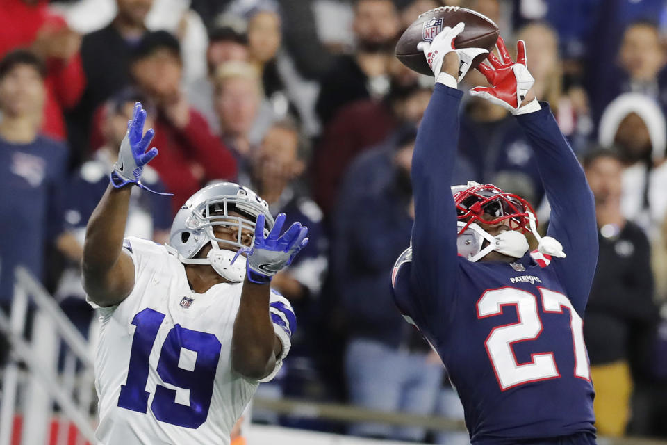 New England Patriots cornerback J.C. Jackson (27) breaks up a pass to Dallas Cowboys wide receiver Amari Cooper (19) during the second half of an NFL football game, Sunday, Oct. 17, 2021, in Foxborough, Mass. (AP Photo/Michael Dwyer)