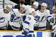 Tampa Bay Lightning center Ross Colton (79) is congratulated after scoring a goal against the Nashville Predators in the first period of an NHL hockey game Saturday, April 10, 2021, in Nashville, Tenn. (AP Photo/Mark Humphrey)