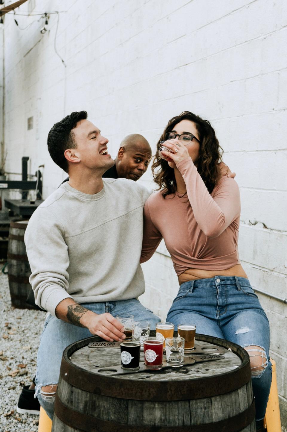 Newly engaged couple Thomas Saunders and Emily Eldridge, with a special appearance by Dave Chappelle. (Photo: Jaycee Marie Photography)