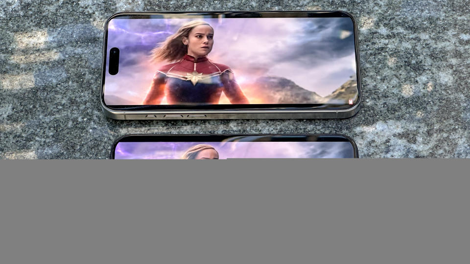 iPhone 15 Pro and iPhone 15 Pro Max displaying trailer for The Marvels