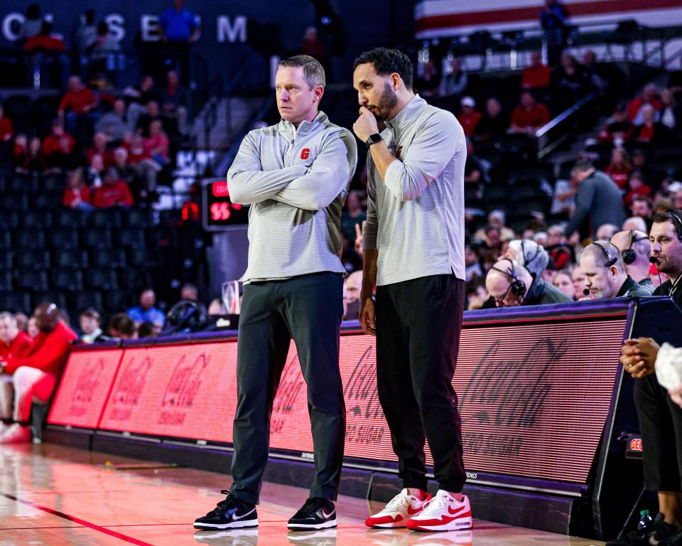 Georgia head coach Mike White, Georgia assistant coach Erik Pastrana during Georgia’s game against Ole Miss at Stegeman Coliseum in Athens, Ga., on Tuesday, Mar. 5, 2024.