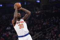 New York Knicks forward Julius Randle shoots a three-point basket in the first half of an NBA basketball game against the Chicago Bulls, Thursday, Dec. 2, 2021, at Madison Square Garden in New York. (AP Photo/Mary Altaffer)