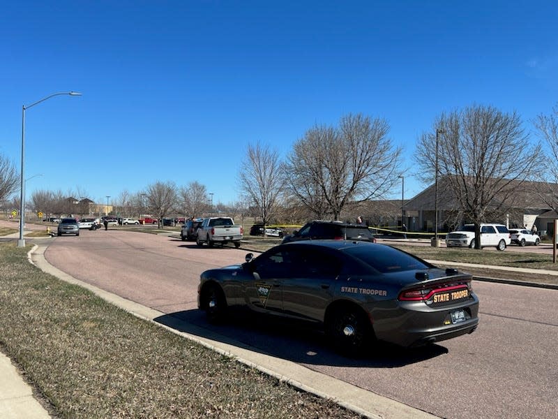 Sioux Falls Police Department officers and South Dakota Highway Patrol respond to a developing situation Thursday, April 4, 2024, near Cayman Court Assisted Living Facility in the 4100 block of W. Cayman Street in Sioux Falls.
