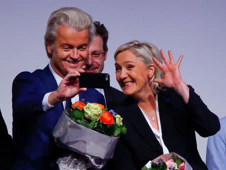 FILE PHOTO:France's National Front leader Marine Le Pen and Netherlands' Party for Freedom (PVV) leader Geert Wilders take a Selfie during a European far-right leaders meeting to discuss about the European Union, in Koblenz, Germany, January 21, 2017. REUTERS/Wolfgang Rattay