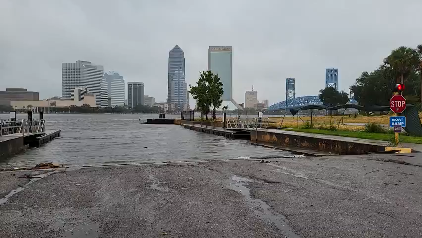 As winds increase and rain gets heavier, the St. Johns River is encroaching on the San Marco boat ramp across from downtown Jacksonville.