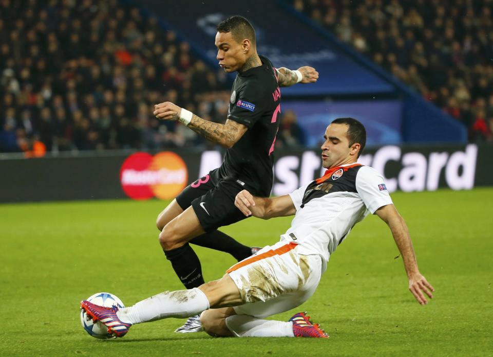 Football Soccer - Paris St Germain v Shakhtar Donetsk - Champions League Group Stage - Group A - Parc des Princes Stadium- 8/12/15 Paris St Germain's Gregory van der Wiel (L) in action with Shakhtar Donetsk's Ismaily. REUTERS/Gonzalo Fuentes