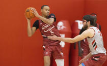 Bryce McGowens, left, looks for an opening past Wilhelm Breidenbach during the Nebraska NCAA college basketball team's Pro Day workout Tuesday, Oct. 5, 2021, at the Hendricks Training Complex in Lincoln, Neb. (AP Photo/Rebecca S. Gratz)