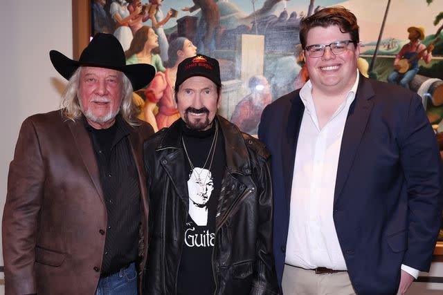 <p>Terry Wyatt/Getty</p> John Anderson, James Burton and Toby Keith's son, Stelen Covel attend the announcement of the 2024 Country Music Hall of Fame Induction at Country Music Hall of Fame and Museum on March 18, 2024 in Nashville