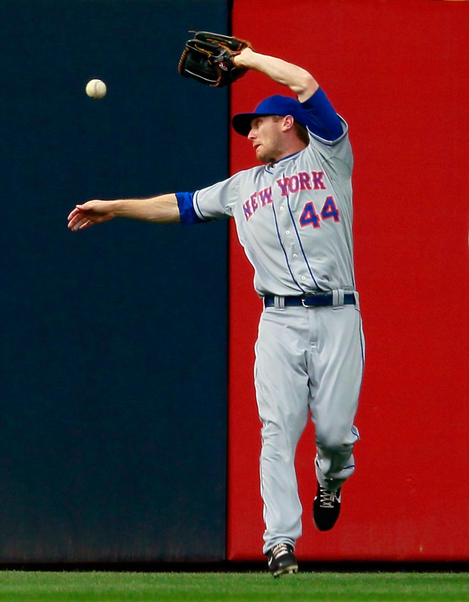 ATLANTA, GA - APRIL 17: Jason Bay #44 of the New York Mets drops a fly ball by Michael Bourn #24 of the Atlanta Braves in the first inning at Turner Field on April 17, 2012 in Atlanta, Georgia. (Photo by Kevin C. Cox/Getty Images)