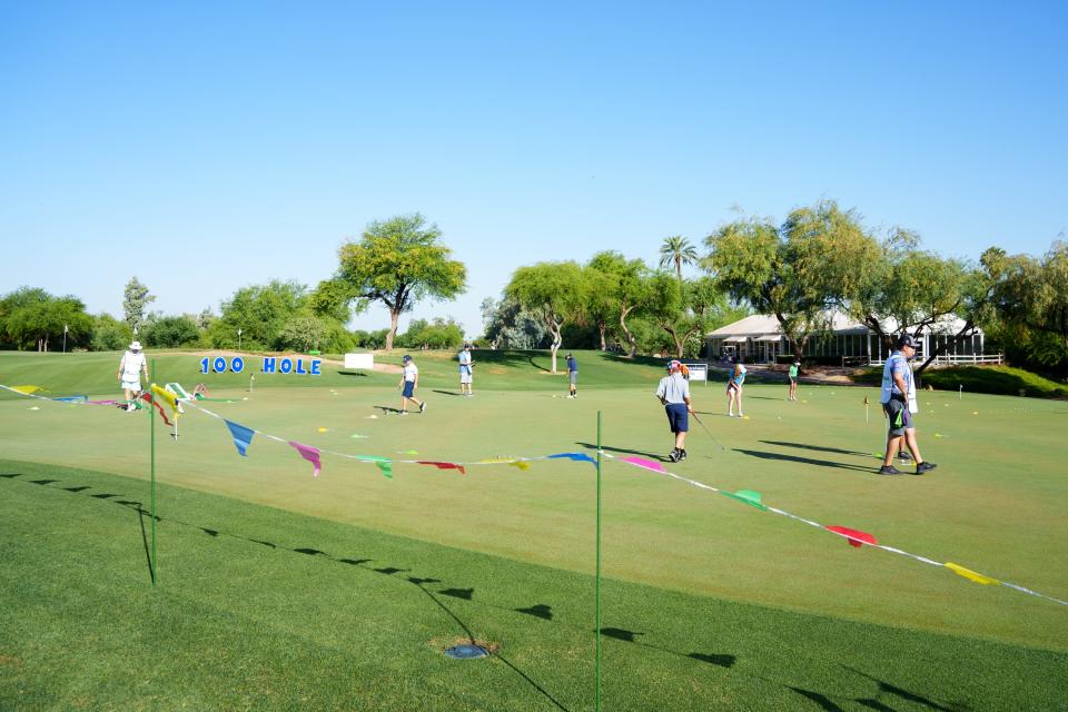 Kids practice putting at First Tee Phoenix's 100-hole Putt-A-Thon at Legacy Golf Resort on June 11, 2022, in Phoenix, AZ.
