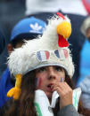 <p>A France fan inside the stadium before the match </p>