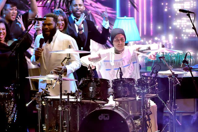<p>Kevin Winter/Getty</p> Anthony Anderson and Travis Barker perform at the 2023 Emmy Awards