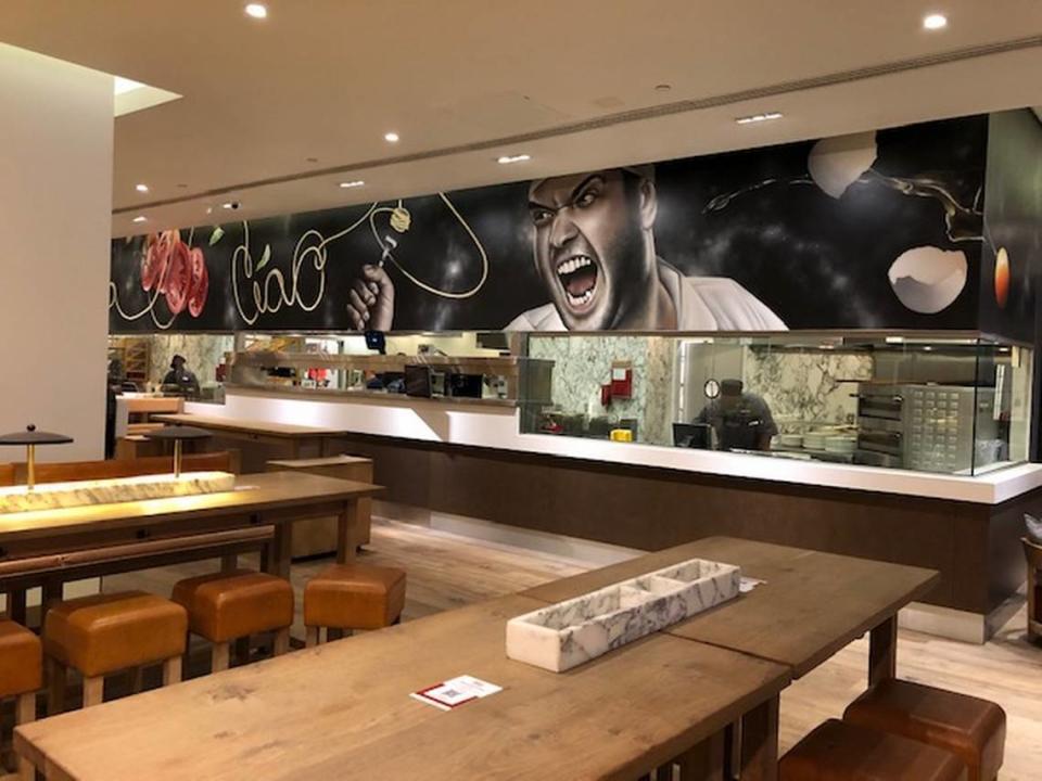 In 2020, Vapiano reopened as The Bella Ciao, which features an updated menu and interior, including a mural from Greensboro mural artist Jeks.