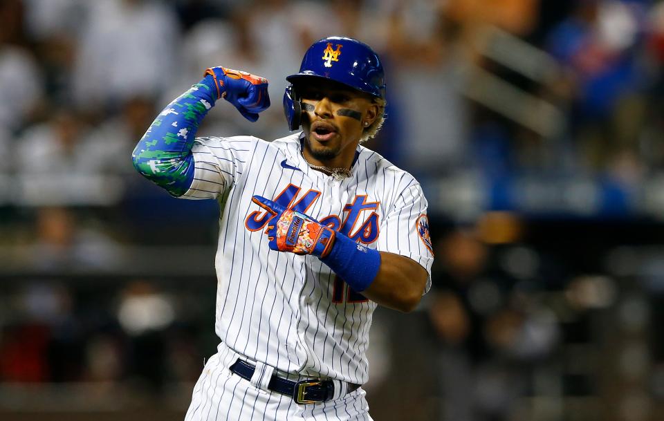 Mets shortstop reacts in the eighth inning after hitting his third home run against the Yankees in a 7-6 win.