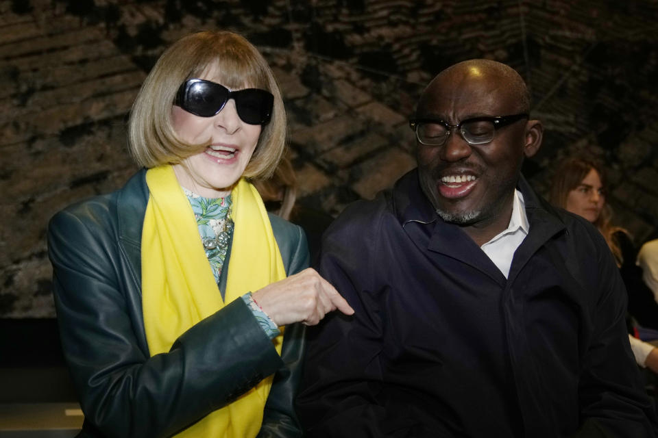 Anna Wintour is flanked by Edward Kobina Enninful, editor-in-chief of British Vogue, as they attend the Tod's women's Fall-Winter 2023-24 fashion show presented in Milan, Italy, Friday, Feb. 24, 2023. (AP Photo/Luca Bruno)