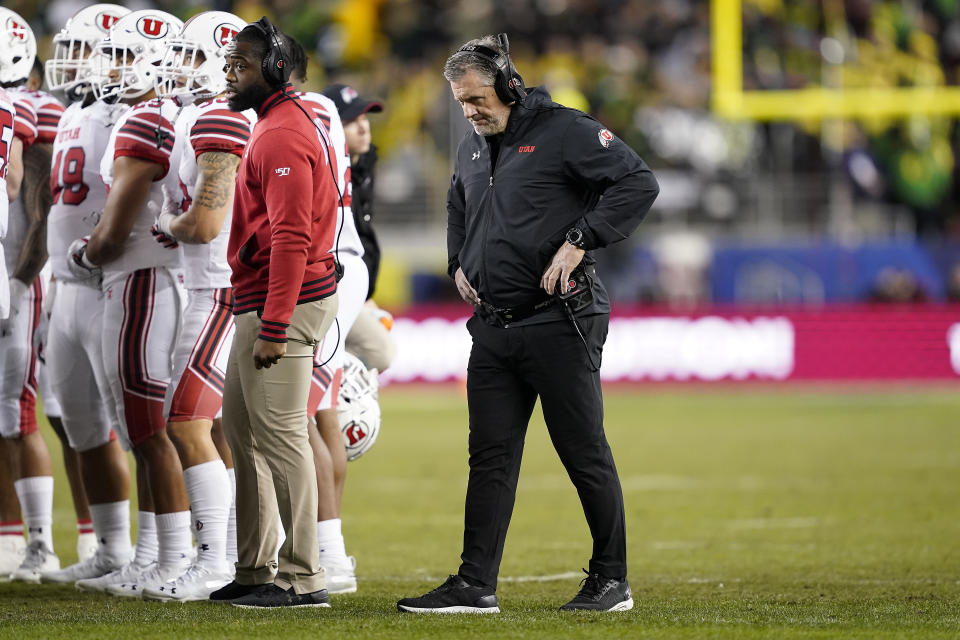 Utah coach Kyle Whittingham walks the sideline during a timeout in the first half of the team's Pac-12 Conference championship NCAA college football game against Oregon in Santa Clara, Calif., Friday, Dec. 6, 2018. (AP Photo/Tony Avelar)