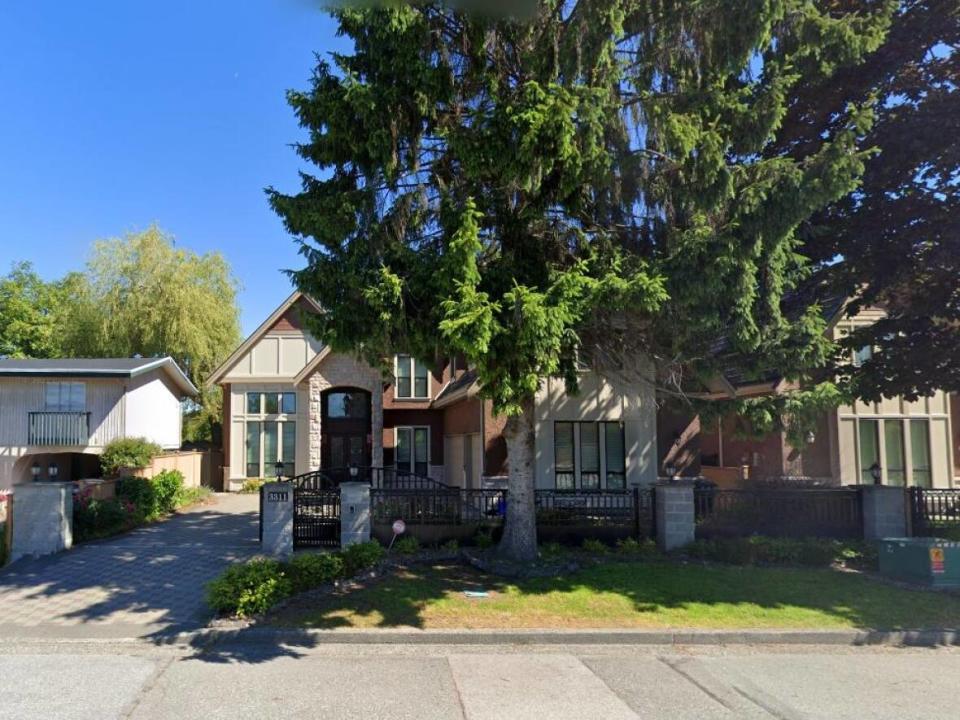 A house at 3311 Blundell Rd. is at the centre of a years-long legal battle between two ex-dance partners that ended Monday when a B.C. Supreme Court justice ruled the 'Chinese contract' outlining the deal is legally enforceable. (Google Maps - image credit)