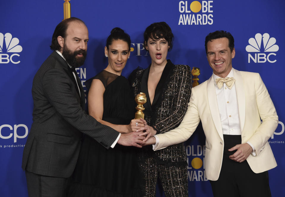 Brett Gelman, from left, Sian Clifford, Phoebe Waller-Bridge and Andrew Scott, from the cast of "Fleabag," pose in the press room with the award for best television series, musical or comedy, at the 77th annual Golden Globe Awards at the Beverly Hilton Hotel on Sunday, Jan. 5, 2020, in Beverly Hills, Calif. (AP Photo/Chris Pizzello)