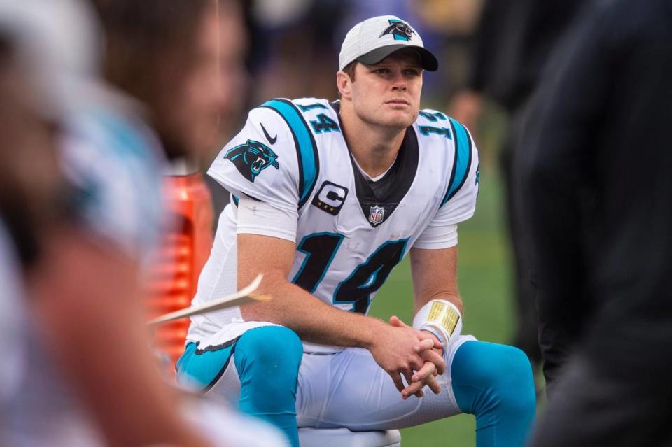 Panthers quarterback Sam Darnold sits on a cooler in the bench area during the game against the Giants at MetLife Stadium on Sunday, October 24, 2021 in Rutherford, NJ. Darnold was taken out of the game in the fourth quarter and replaced with backup quarterback, PJ Walker.