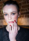 <b>Sass & Bide </b><br><br>Models wowed backstage with golden eyeshadow, a flush of colour to the cheeks and red nails.<br><br>Image © Getty