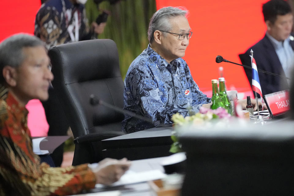 Thailand's Foreign Minister Don Pramudwinai, center, attends the Association of Southeast Asian Nations (ASEAN) foreign ministers retreat in Jakarta, Indonesia, Saturday, Feb. 4, 2023. (AP Photo/Achmad Ibrahim)