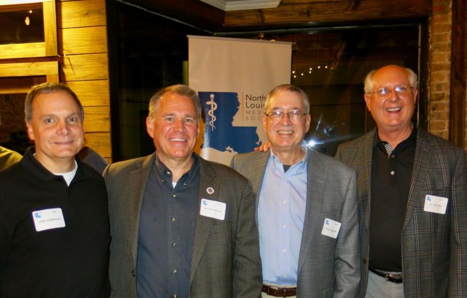 Caddo Judge Craig Marcotte, State Representative
Alan Seabaugh, Dr. Phillip Rozman and State Senator Robert Mills at the Northwest Louisiana Medical Society's Oyster Party.