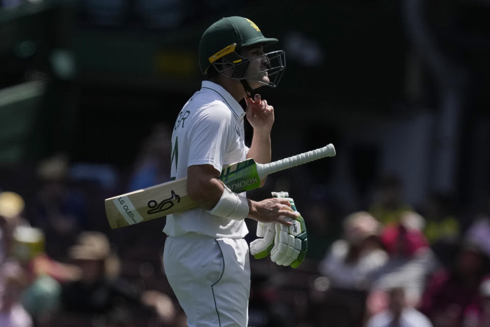 South Africa's Dean Elgar walks off after he was caught out by Australia during the fifth day of their cricket test match at the Sydney Cricket Ground in Sydney, Sunday, Jan. 8, 2023. (AP Photo/Rick Rycroft)