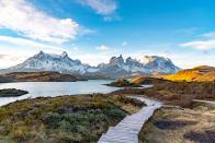 Traveling to Patagonia is, essentially, a voyage to the ends of the earth. You'll need to first connect through a South American hub, like the tango capital of <a href="https://www.cntraveler.com/destinations/buenosaires?mbid=synd_yahoo_rss" rel="nofollow noopener" target="_blank" data-ylk="slk:Buenos Aires;elm:context_link;itc:0;sec:content-canvas" class="link ">Buenos Aires</a> or metropolitan Santiago, Chile—arguably warranting a few days of their own—before you reach the alpine lakes and glaciers of Patagonia. Explore Torres del Paine National Park, one of <a href="https://www.cntraveler.com/gallery/most-beautiful-places-in-chile?mbid=synd_yahoo_rss" rel="nofollow noopener" target="_blank" data-ylk="slk:Chile;elm:context_link;itc:0;sec:content-canvas" class="link ">Chile</a>'s most iconic landscapes, and hang with Magellanic penguins at the Otway Sound, on the way to Puerto Natales (also in Chile). Or, listen to the cracks of Argentina's Perito Moreno Glacier, which is constantly moving. Plan ahead to hit it all, with stays in world-class lodges like <a href="https://www.cntraveler.com/hotels/chile/torres-del-paine-national-park/hotel-salto-chico-explora-patagonia-torres-del-paine-national-park?mbid=synd_yahoo_rss" rel="nofollow noopener" target="_blank" data-ylk="slk:Explora Patagonia.;elm:context_link;itc:0;sec:content-canvas" class="link ">Explora Patagonia.</a>