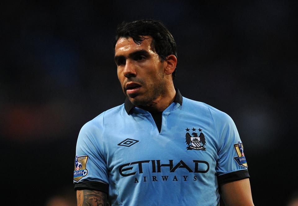 Carlos Tevez has retired at the age of 38 (Martin Rickett/PA) (PA Archive)