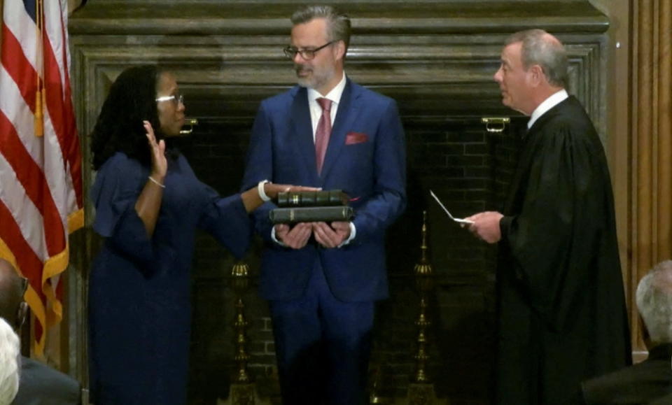 Supreme Court Associate Justice Ketanji Brown Jackson is sworn in by Chief Justice John Roberts on Thursday.