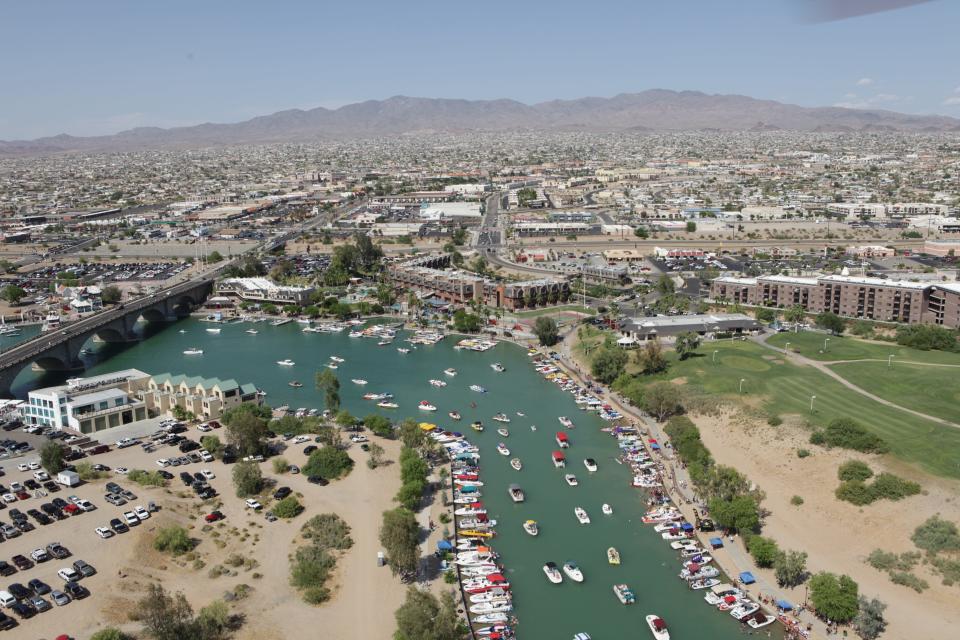 Lake Havasu City, known as "Arizona's playground," has 400 miles of coastline and 60 miles of navigable waterways. People flock to the area for activities including boating, hiking, biking, fishing and golfing.