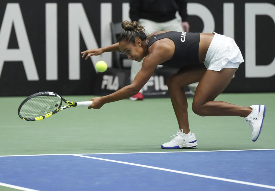 Canada's Leylah Fernandez reaches for a shot from Belgium's Yanina Wickmayer during a Billie Jean King Cup tennis qualifier Friday, April 14, 2023, in Vancouver, British Columbia. (Darryl Dyck/The Canadian Press via AP)