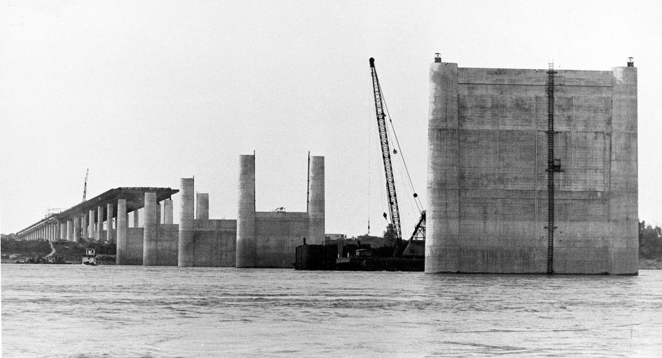 I-40 Bridge construction over the Mississippi River progresses on 1 Nov 1970.