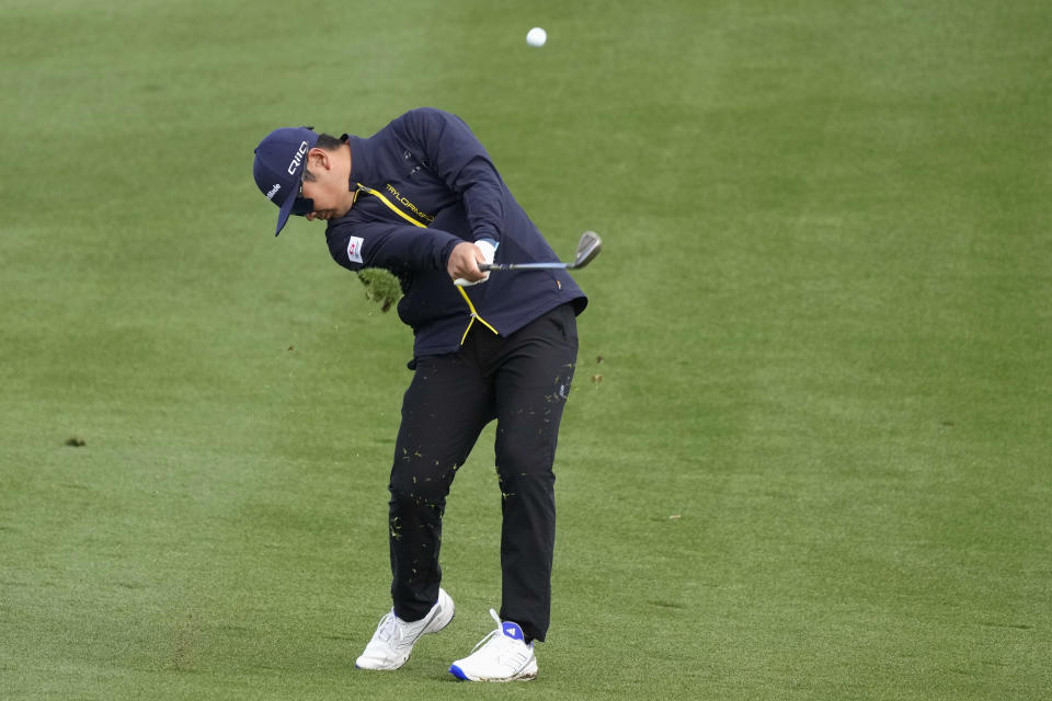 Ryo Hisatsune, of Japan, hits his approach shot at the second hole during the continuation of the second round of the Phoenix Open golf tournament Saturday, Feb. 10, 2024, in Scottsdale, Ariz. (AP Photo/Ross D. Franklin)