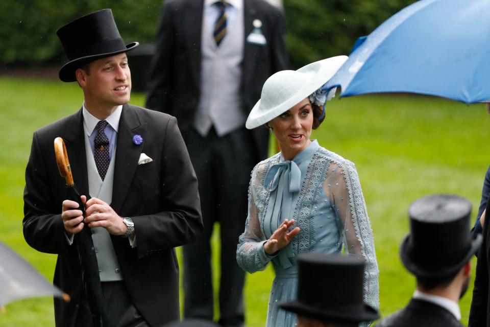 William and Kate, pictured here at Ascot this week, have been in touch with the woman involved in the collision (AP)