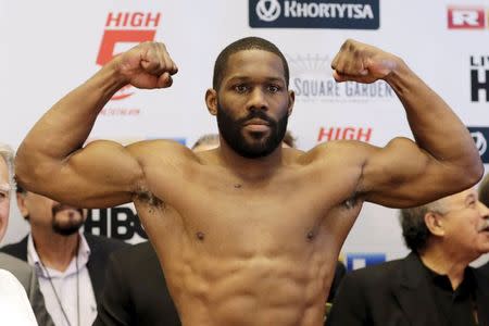 U.S. boxer Bryant Jennings clenches his fists during an official weigh-in ahead of his fight in New York April 24, 2015. REUTERS/Eduardo Munoz