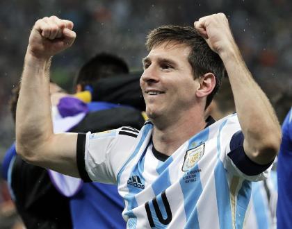 Lionel Messi pumps his fists after Argentina's shootout win over the Netherlands. (AP)