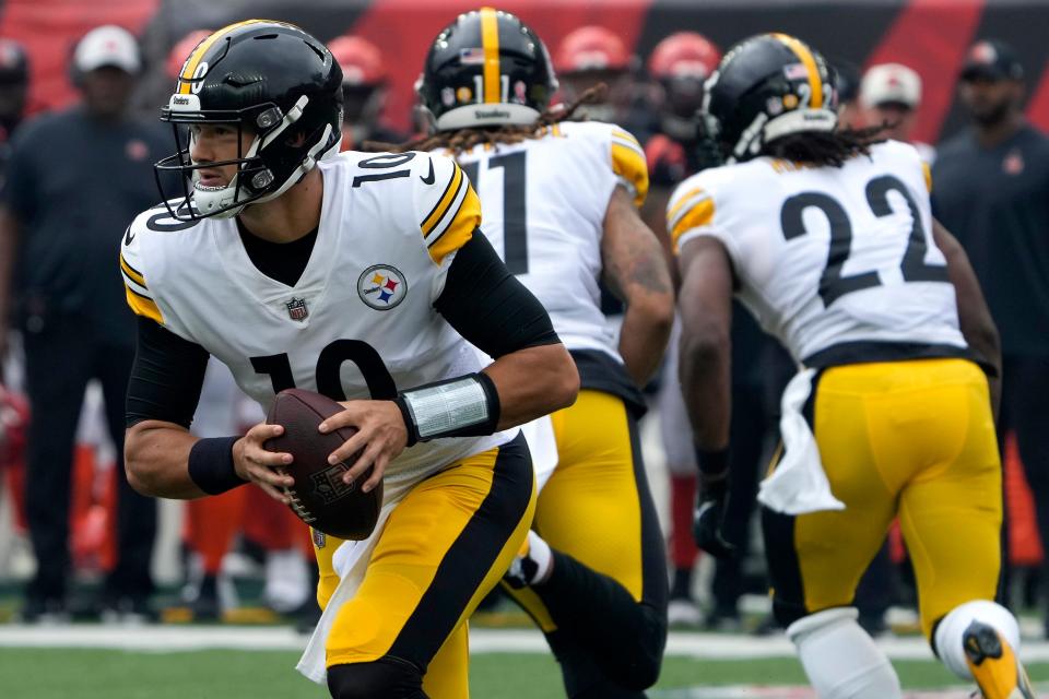 Pittsburgh Steelers quarterback Mitch Trubisky (10) rolls out of the pocket during the first quarter of a Week 1 NFL football game against the Cincinnati Bengals, Sunday, Sept. 11, 2022, Paycor Stadium in Cincinnati. Mandatory Credit: Cara Owsley-USA TODAY Sports