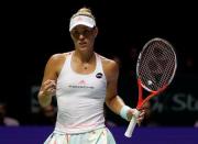 Tennis - Singapore WTA Finals Round Robin Singles - Singapore Indoor Stadium, Singapore - 27/10/2016 - Angelique Kerber of Germany celebrates a point against Madison Keys of the U.S. REUTERS/Edgar Su