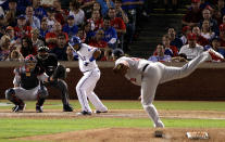 ARLINGTON, TX - OCTOBER 22: Lance Lynn #62 of the St. Louis Cardinals pitches to Elvis Andrus #1 of the Texas Rangers in the sixth inning during Game Three of the MLB World Series at Rangers Ballpark in Arlington on October 22, 2011 in Arlington, Texas. (Photo by Rob Carr/Getty Images)