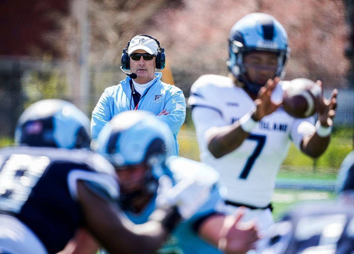 URI head football coach Jim Fleming watches his team during its annual Blue-White game in April.