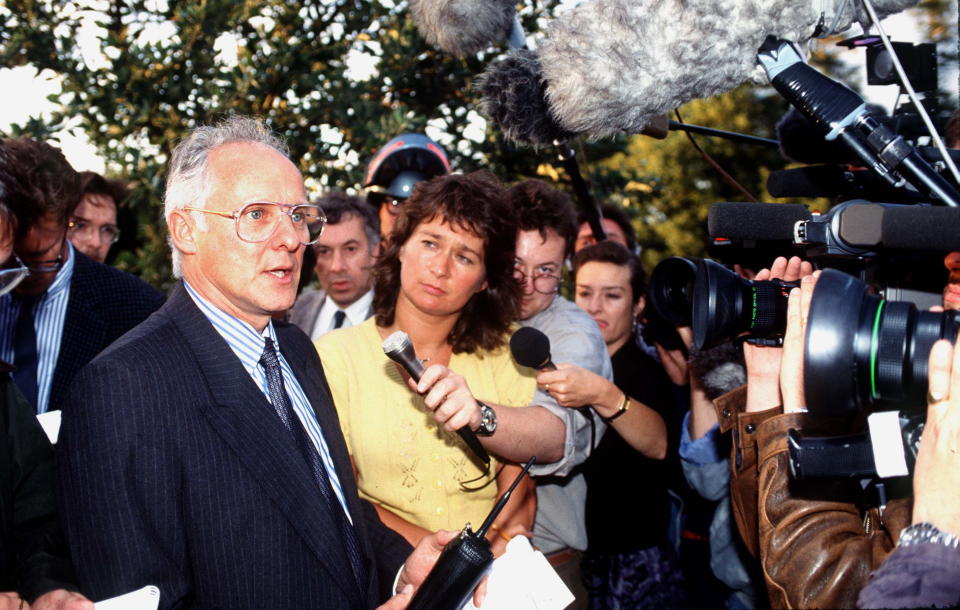 CIRENCESTER, UNITED KINGDOM - JULY 01:  Dickie Arbiter, Press Secretary For The Prince And Princess Of Wales, Talks With Journalists And Tv Crews At Cirencester Hospital After Prince Charles Sustained A Polo Injury.  (Photo by Tim Graham Photo Library via Getty Images)