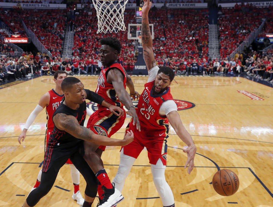 Nearly everywhere Damian Lillard has gone in this series, he has been forced to work around the arms and bodies of Jrue Holiday, Nikola Mirotic and Anthony Davis. (AP)