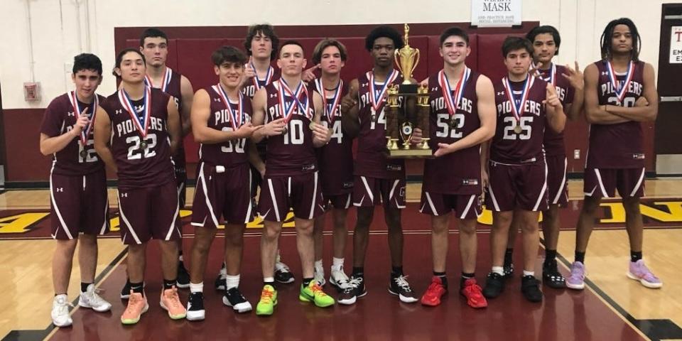 The Mt. Whitney High School boys basketball team won the 2021 Tulare Holiday Classic.