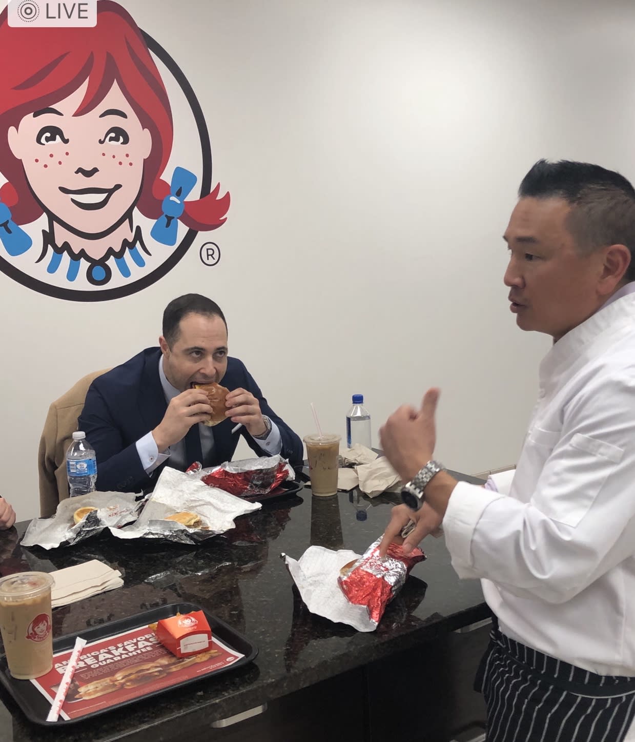 Yours truly samples Wendy's breakfast menu inside the company's headquarters in Columbus, Ohio. Wendy's vice president of culinary innovation (right) John Li explains his inspiration for the menu was brunch. 