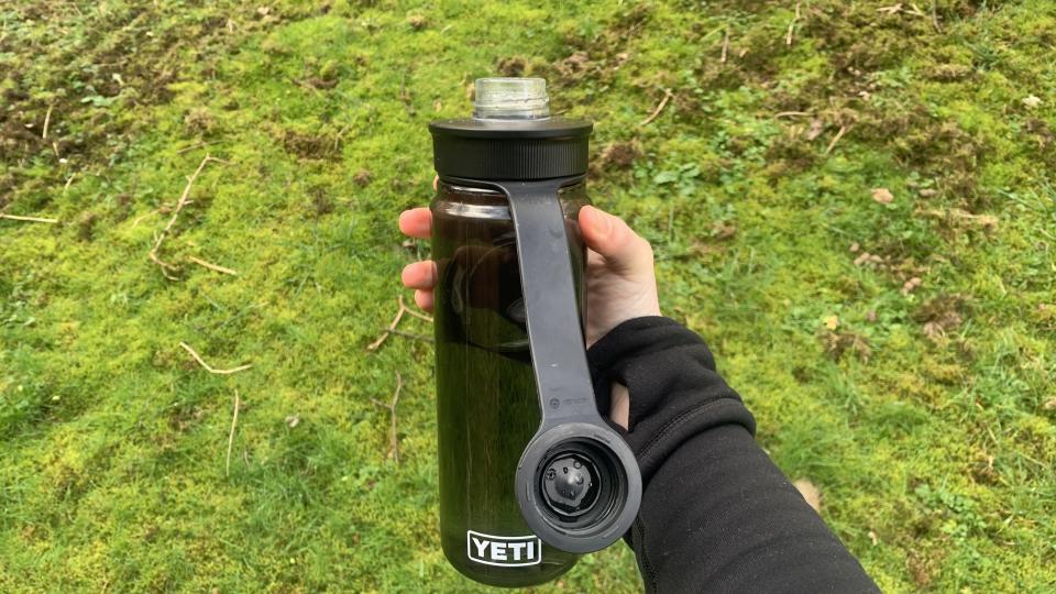 Hand holding Yeti water bottle