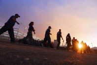 <p>Fire crews return from fighting a wildfire near the ski town of Brian Head, June 27, 2017, in Panguitch, Utah. (Scott G Winterton/The Deseret News via AP) </p>